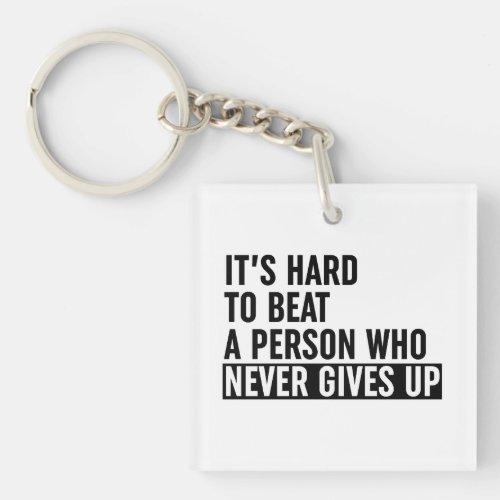 Its Hard To Beat A Person Who Never Gives Up Keychain
