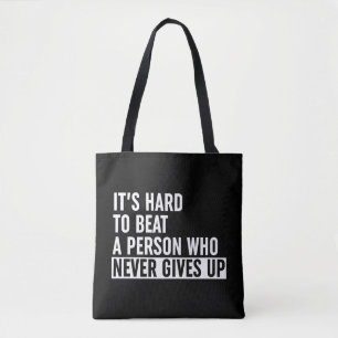 It's Hard To Beat A Person Who Never Gives Up Tote Bag