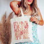 Its Me Hi Im the Maid Of Honor Its Me Personalized Tote Bag<br><div class="desc">Introducing the "It's Me Hi I'm the Maid of Honor" Personalized Tote Bag – the perfect blend of style and functionality for your esteemed Maid of Honor. This trendy and cute peach coral pink tote bag is not just an accessory; it's a statement piece that reflects the importance of your...</div>