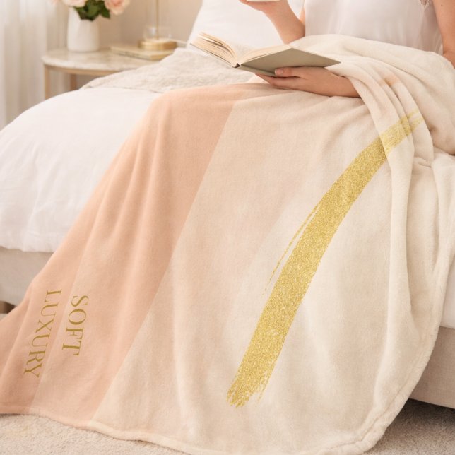 Ivory Blush Gold Fleece Blanket (A soft ivory base with blush fade and gold contrast for refined bedroom layering.)