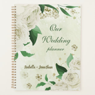 Ivory white flowers greenery wedding planner
