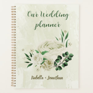 Ivory white flowers greenery wedding planner