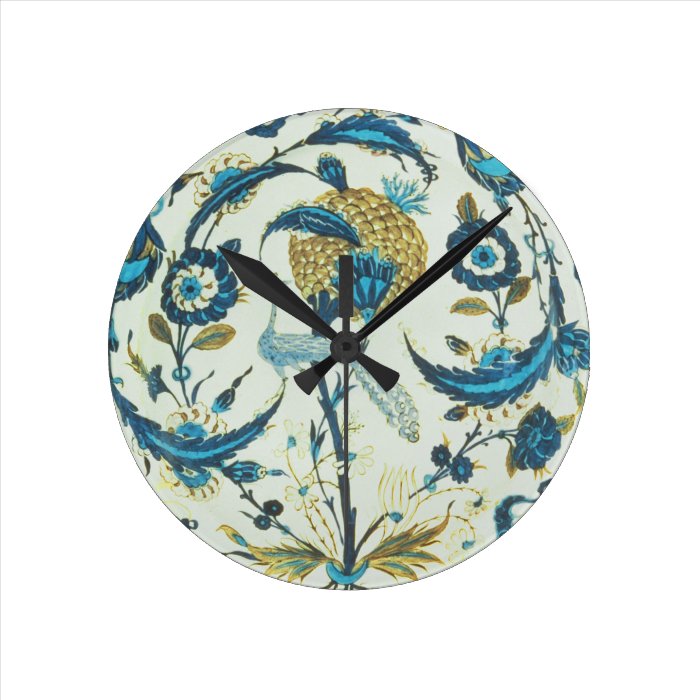 Iznik dish painted with a peacock perched among fl wall clocks