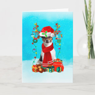 Jack Russell in snow with Christmas gifts Card