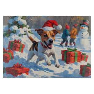 Jack Russell Running in Snow with Christmas Hat Cutting Board