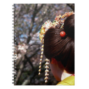 Japan, Kyoto. Rear view close-up of geisha's Notebook