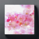 Japanese Cherry Tree with Pastel Pink Blossoms Plaque<br><div class="desc">Springtime fresh floral image. Fancy japanese cherry tree blossoms in soft delicate pinks and gentle whites. Some bright pink and luminous yellow colored swirls and twinkling lights surround these blossoms giving it a magical dreamy effect, like something from a fairy universe. Faded handwritten text in french gives it a romantic...</div>