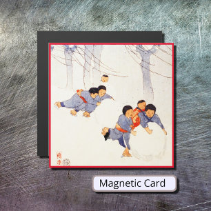 Japanese children rolling large snow balls 