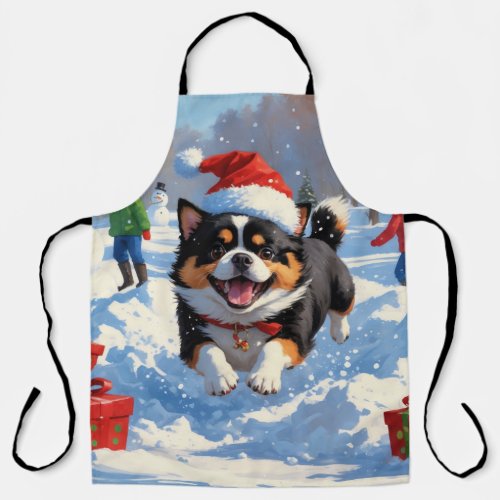 Japanese Chin Running in Snow with Christmas Hat Apron