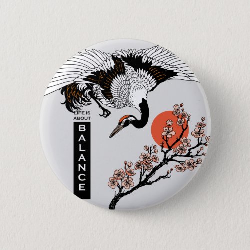 Japanese crane bird and blooming sakura button
