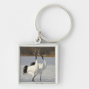 Japanese Cranes dancing on snow Keychain