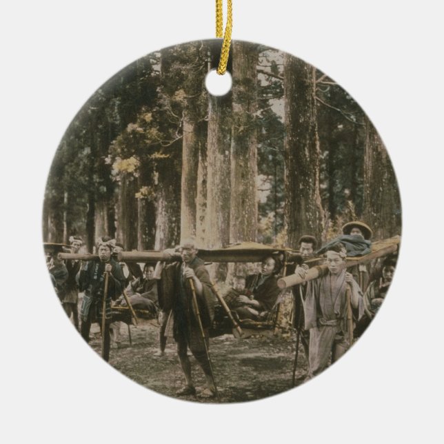 Japanese family being carried in litters, c.1880s ceramic ornament (Front)