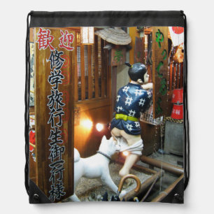 Japanese Humor - Dog Pulling Pants Down Drawstring Bag