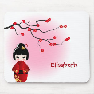 Japanese kokeshi doll at sakura blossoms mouse pad