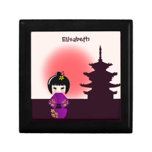 Japanese kokeshi doll at temple during sunset jewelry box