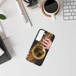 Jazzman Playing Gold Saxophone Samsung Galaxy S22 Case<br><div class="desc">For music lovers! Protect your Samsung Galaxy S22 phone with this trendy phone case that features the photo image of a jazzman playing his time-worn,  gold colored,  tenor saxophone horn. Select your phone style.</div>