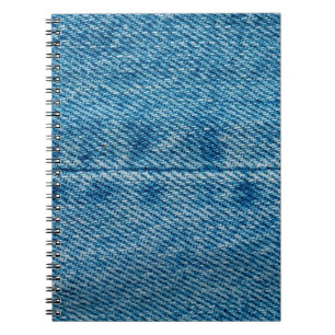 Jeans close up background. Denim stitching. Blue f Notebook