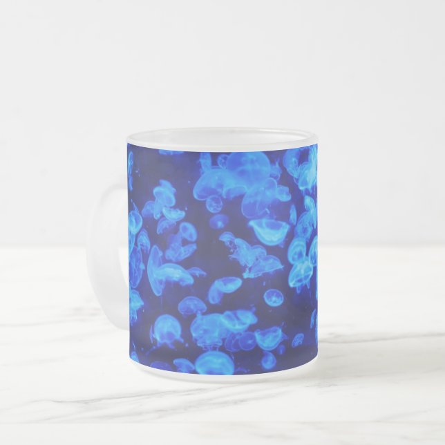 Jellyfish in Deep Blue Sea Frosted Glass Coffee Mug (Front Left)