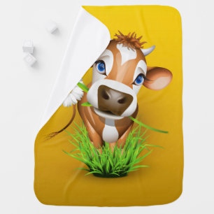 Jersey cow in grass over yellow baby blanket