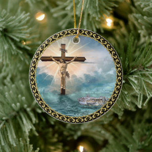 Jesus hanging from a christian crucifixion cross. ceramic ornament