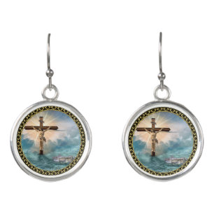 Jesus hanging from a christian crucifixion cross. earrings