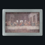 Jesus "Yeshua" The Last Supper, Leonardo da Vinci Belt Buckle<br><div class="desc">The air hung heavy with the scent of oil paints and plaster. Sunlight slanted through the high windows of the refectory, casting long shadows across the scaffolding that jutted out from the wall. Perched precariously on the highest platform, Leonardo da Vinci dabbed his brush with a fiery red, his brow...</div>