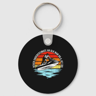 Jet skiing underestimate an old man on a jet ski keychain
