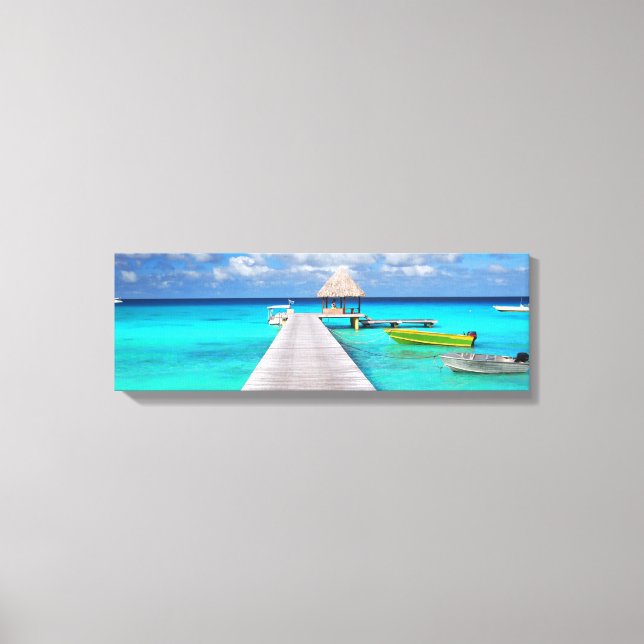 Jetty with boats in a tropical lagoon canvas print (Front)