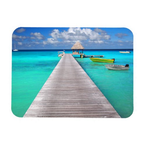 Jetty with boats in a tropical lagoon magnet