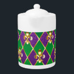 Jewelry Background Mardi Gras Teapot<br><div class="desc">jewelry,  background on  Mardi Gras of purple and green rhombus,  decorated gold lilies.</div>