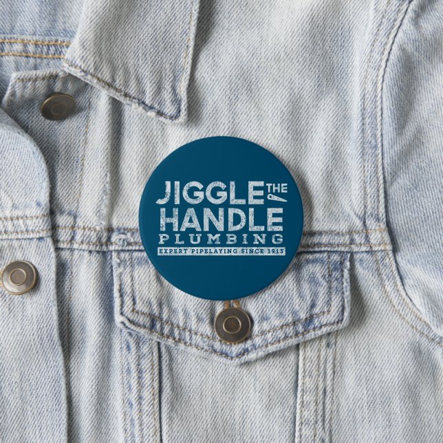 Jiggle the Handle Plumbing White Gfx Teal BG Button (In Situ)