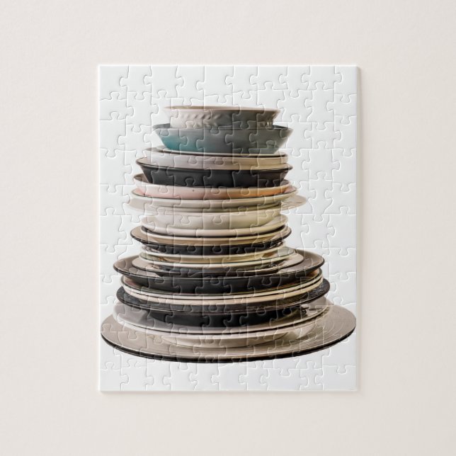 Jigsaw puzzle of a stack of plates. (Vertical)