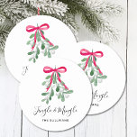 Jingle And Mingle Mistletoe Christmas Round Paper Coaster<br><div class="desc">These Christmas party paper coasters are decorated with watercolor green mistletoe,  a red ribbon,  and stylish script typography that says "Jingle And Mingle"
Easily customizable.
Original Watercolour © Michele Davies.</div>