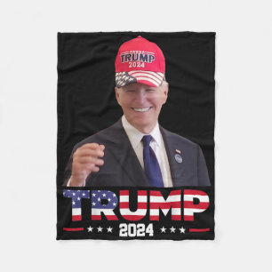 Joe Biden Wearing A Trump Hat 1  Fleece Blanket