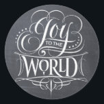 JOY Chalkboard Christmas Calligraphy Lettering Classic Round Sticker<br><div class="desc">JOY TO THE WORLD. Whenever I sing this Christmas carol, the 'Joy' portion is always so much fun. It comes out in full strength and with… JOY. That was the inspiration for this marvelous piece of chalk calligraphy art by professional lettering artist Ivan Angelic. This is the chalkboard version, there...</div>