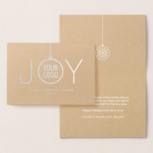 JOY Company Logo Kraft Modern Holiday Silver Real Foil Card - Send simply elegant Holiday wishes with the luxe shine of silver real foil on premium kraft paper.    Your company logo appears inside an ornament that forms the O in JOY. For best results, logo image should be black with a white or transparent background. IF YOU NEED TO CHANGE YOUR LOGO BACKGROUND FROM WHITE TO TRANSPARENT, SEE INSTRUCTIONS BELOW. 
Text can easily be customized or deleted to include any greeting, such as Happy Holidays, Seasons Greetings, Merry Christmas, Happy New Year, or other text as needed for corporate use. The simple modern design features luxurious foil on front and a chic white printed interior, with stylish classic typography. Represent your business in style with the sophisticated luxury of this personalized holiday greeting card.

TO CHANGE LOGO BACKGROUND FROM WHITE TO TRANSPARENT:  Click "Personalize" or "Personalize this template", then scroll down and choose "Click to customize further."  In column on left hand side click "Your Logo." On the menu at the right under "Remove white from image," choose either "Background only" or "All white in image." When finished, click "Done."