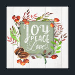 Joy, Peace, Love Chalkboard Wreath ID437 Canvas Print<br><div class="desc">This country-style wrapped canvas design features leaves,  walnut shells and berries surrounding typography of 'Joy,  Peace and Love' on a sage green chalkboard. Background is rustic,  whitewashed wood. Search ID437 to see other products with this design.</div>
