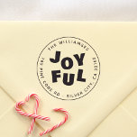 Joyful Cute Modern Round Christmas Family Address Rubber Stamp<br><div class="desc">This Christmas rubber stamp features your family name and return address in modern round typography. Around the outside, there is a simple circular frame. In the middle of the design, "joyful" is printed in bold serif capitals. The letters are rotated and placed in a fun jumbled way. Made to match...</div>