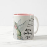 Joyful Hummingbird Mom Birthday Watercolor Two-Tone Coffee Mug<br><div class="desc">Celebrate your mother’s birthday with a joyful hummingbird mug for coffee or tea,  She can relax and read the verse,  “Like hummingbird wings,  your love is a joyful gift.” Elegant colors of cream,  pink and green create a stylish gift for birdwatchers,  gardeners and flower lovers.</div>