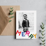 Joyful Lettering Shiny Silver Photo Foil Holiday Card<br><div class="desc">Step into a world of minimalist charm and vibrant joy with this delightful holiday card design. Against a clean white background, your custom photo shines at the forefront, capturing a cherished moment that embodies the spirit of the season. Playful and bold, large capital letters form the word "MERRY" below the...</div>