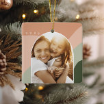 Joyful Shades | Custom Name & Year Photo Ceramic Ornament<br><div class="desc">Add a favorite photo to this square ornament for a festive and memorable addition to your tree! Design features a vertical or portrait oriented photo in a unique arched layout, on a background of organic wavy stripes in shades of light forest green and light clay. Personalize the front with the...</div>
