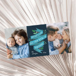 Joyous Tidings Hanukkah Photo Card<br><div class="desc">Beautifully illustrated photo card features two favorite photos. "May love and light fill your heart at Hanukkah" appears in the center in hand lettered typography on a blue watercolor ribbon accented with green leaves and white berries. Personalize with your names and the year in white lettering.</div>