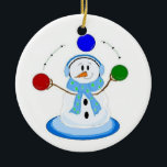 Juggling Snowman Ceramic Ornament<br><div class="desc">A cool snowman juggling colored balls of red,  blue and green. All wrapped up in his earmuffs and scarf.</div>