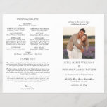 Julia Catholic Wedding Mass Ceremony Program<br><div class="desc">This elegant, Catholic wedding ceremony program with full mass template comes in a folded, booklet style. On the front cover it features one of your engagement photos, cropped into a square shape, and your details written in a classic serif font with beautiful calligraphy script accents. The neutral, minimalist, black and...</div>