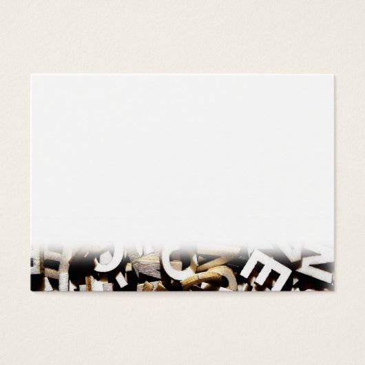 Jumbled letters made of wood close up (Front)