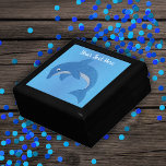 Jumping Cute Dolphin in Glittery Blue and White Gift Box<br><div class="desc">This wood gift box for trinkets,  jewelry,  or gift giving has a cute dolphin in a jumping position who is a glittery deep blue with white stomach on a water like blue background. 
 Customise your text with the template.</div>