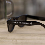 Junior Groomsman Wedding Sunglasses<br><div class="desc">*Sunglasses are standard size* A pair of cool sunglasses is just what your Junior Groomsman needs as a thank you for being the best junior groomsman. Just add his name and your wedding date. Can be used for any member of the wedding party. Please note that the wedding date will...</div>