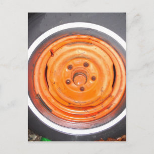 Junk Yard vintage Wheel, orange black and white Postcard