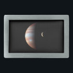 Jupiter Gas Giant Planet & Io Galilean Moon Belt Buckle<br><div class="desc">This captivating image, a composite of spacecraft data, showcases the contrasting landscapes of Jupiter and its volcanic moon Io. Captured by New Horizons during its 2007 flyby, the giant gas planet Jupiter dominates the scene. Its swirling atmosphere is rendered in a mesmerizing infrared palette, highlighting the variations in cloud altitude...</div>