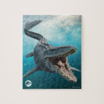 Jurassic World | Mosasaurus - Kids Jigsaw Puzzle<br><div class="desc">An immense seagoing lizard-and not an actual dinosaur-she uses her fearsome array of teeth to catch fish, birds, and other marine reptiles. Mosasaurus's second set of teeth in an upper palate ensures any prey sliding down her throat will not be able to escape... including the mercenary soldier that T.Rex drives...</div>